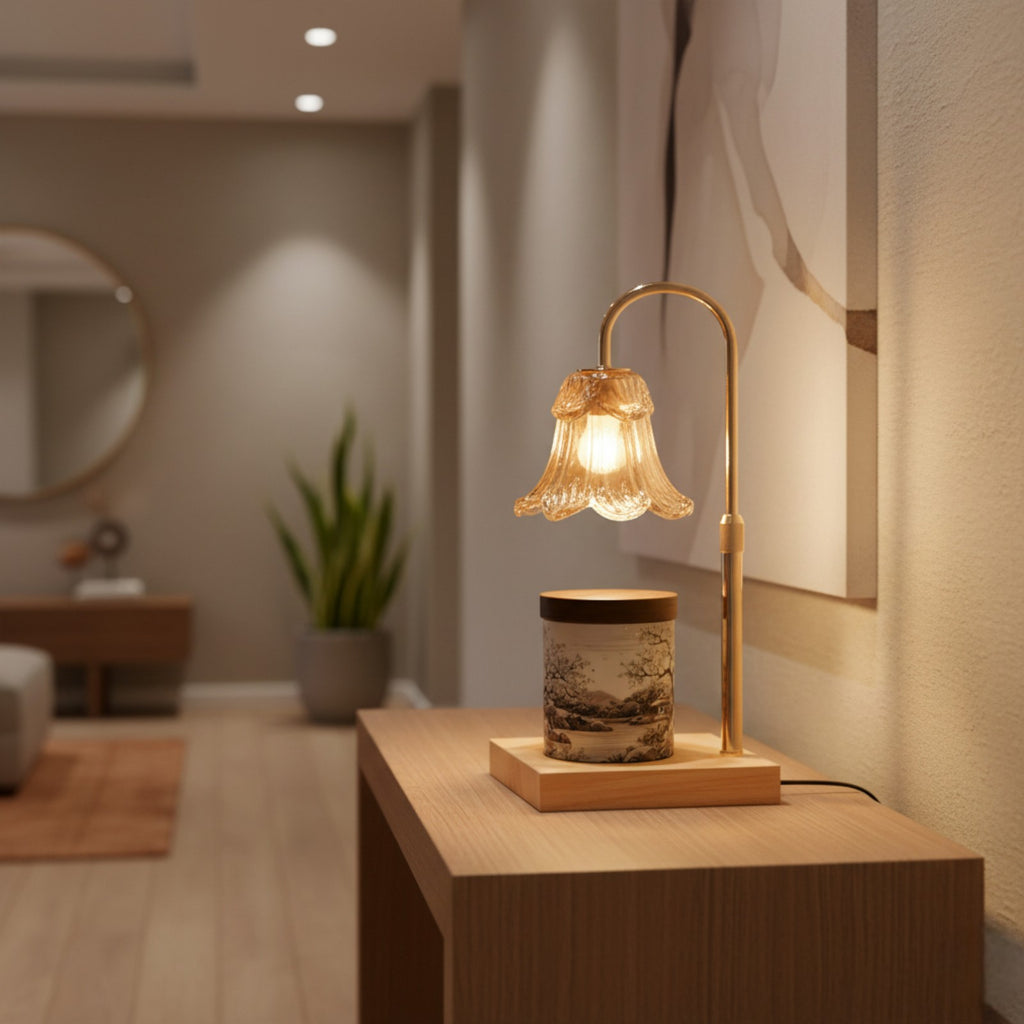 Decorative table lamp with a glass shade on a wooden surface in a softly blurred room setting.