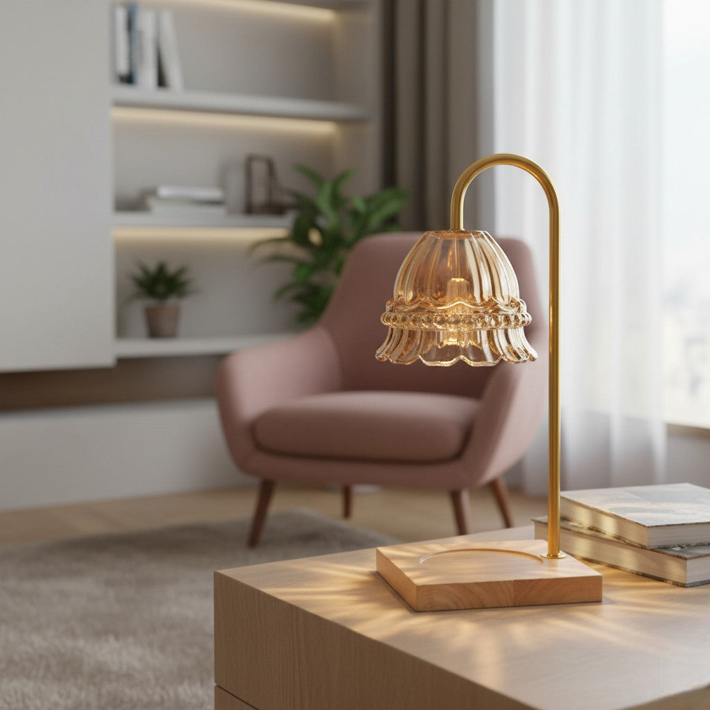 Gold table lamp on a wooden surface with a modern interior setting