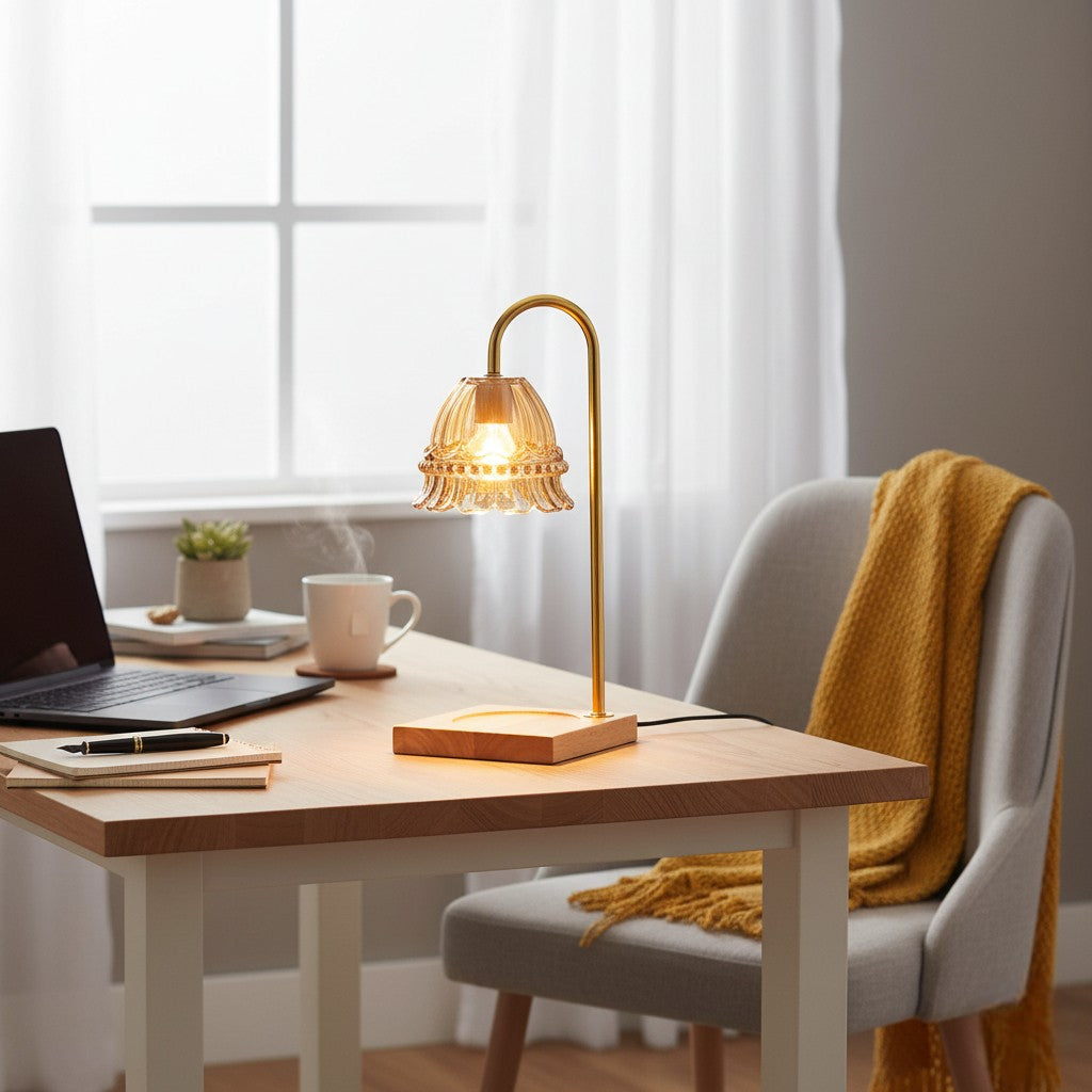 Home office setup with a desk, lamp, laptop, and chair.