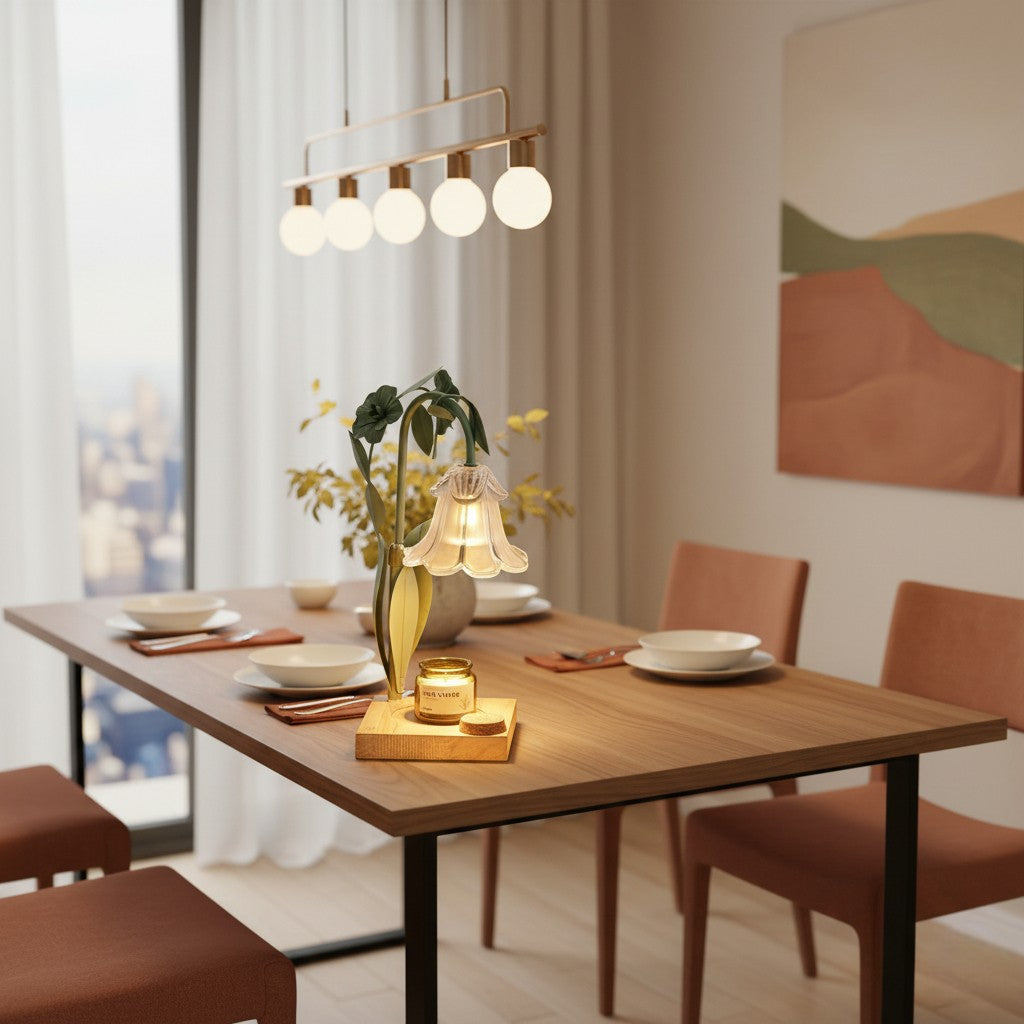 Dining room with a wooden table, chairs, and decorative items including a lamp and vase.