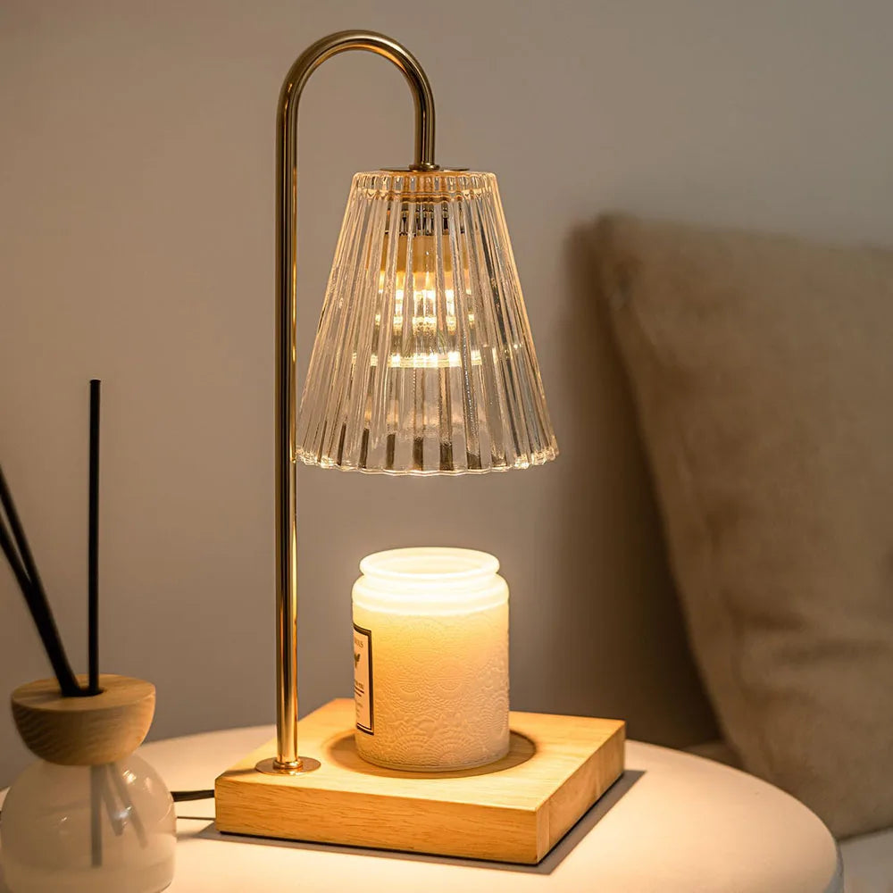 Decorative lamp with candle on a wooden base in a cozy setting