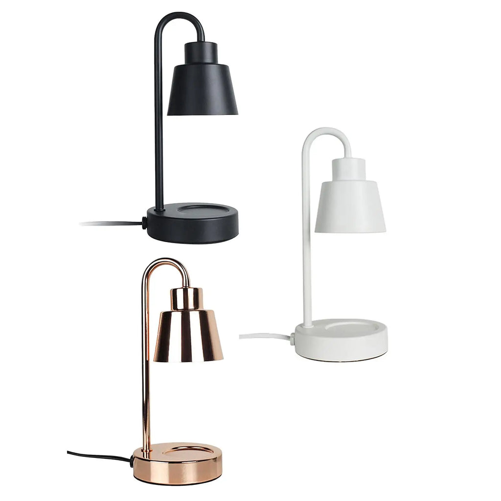 Three table lamps in black, bronze, and white on a white background