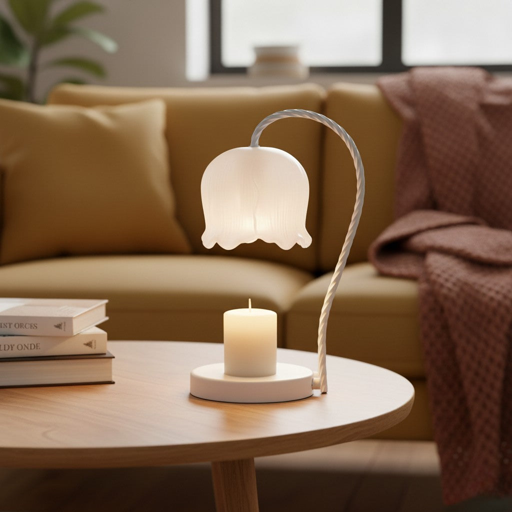 Table lamp with a white shade on a wooden table in a cozy living room.